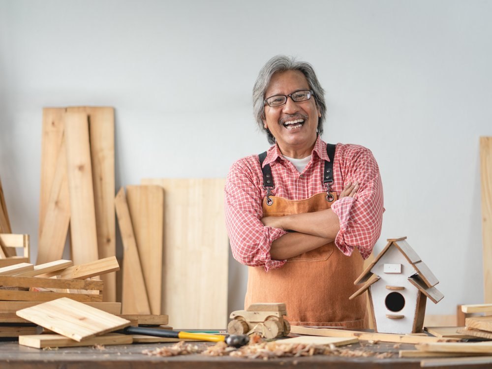 Official WhatsApp small-business illustration: a small-business maker in a workshop